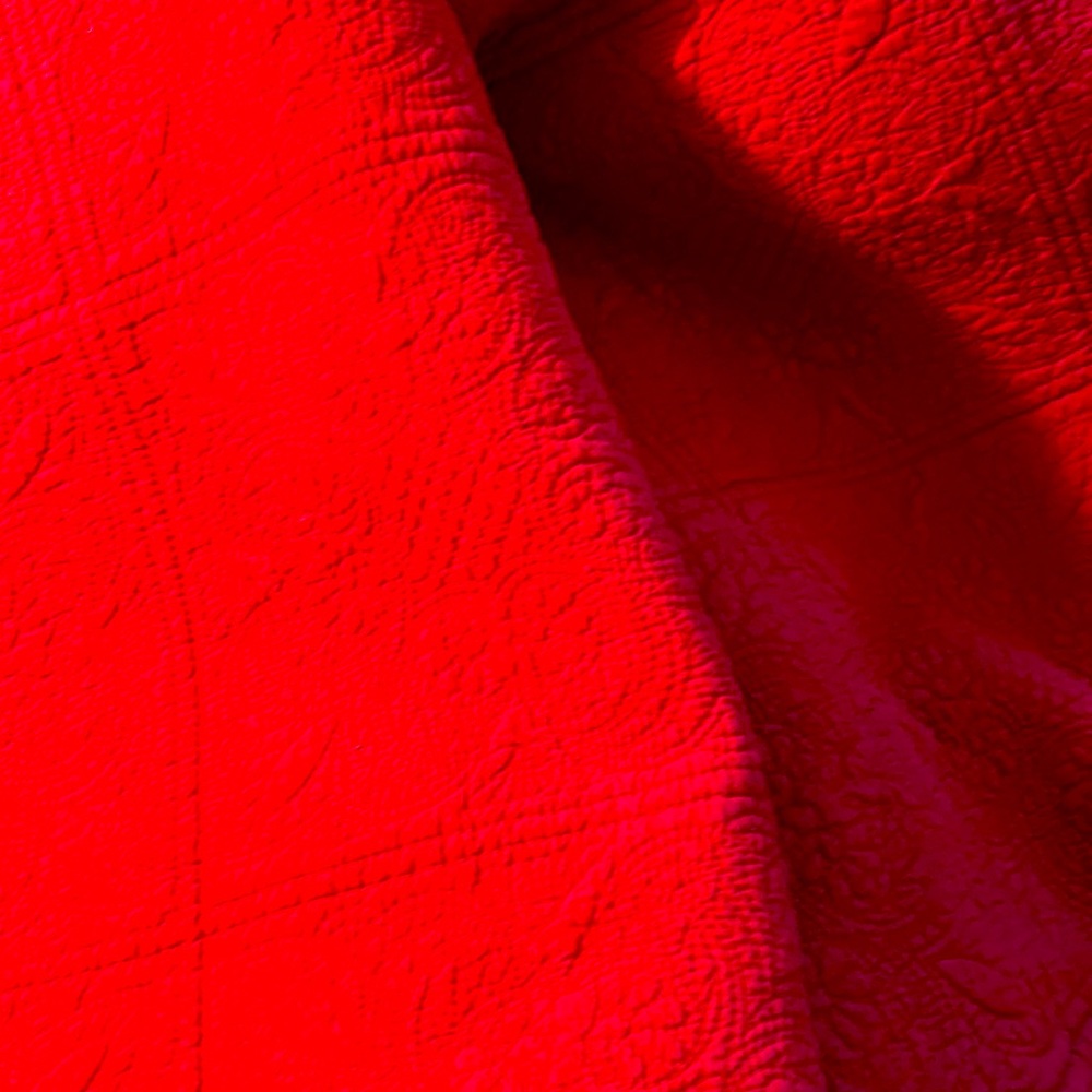 Red quilt queen size bed with two pillow shams so pretty.  30 percent off
